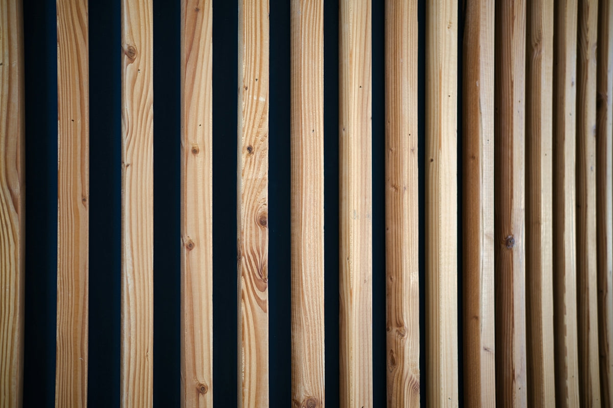 A close up of a wooden slatted wall
